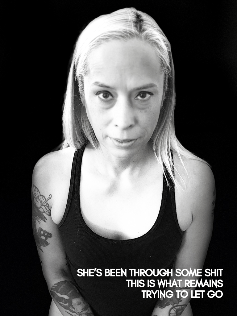 Black and white self-portrait by Baroque Medusa with centered composition and textual overlay, fine art portrait series