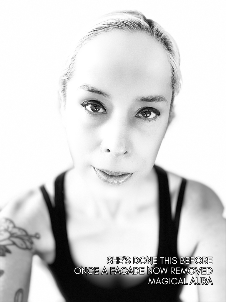 Black and white portrait photograph by Baroque Medusa with calm expression and minimalist aesthetic