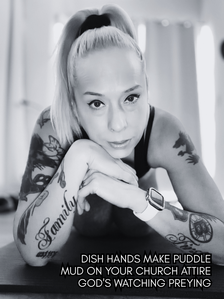 Black and white portrait of Baroque Medusa leaning forward with folded hands, tattoos visible, overlaid with a haiku about judgment and consequence.