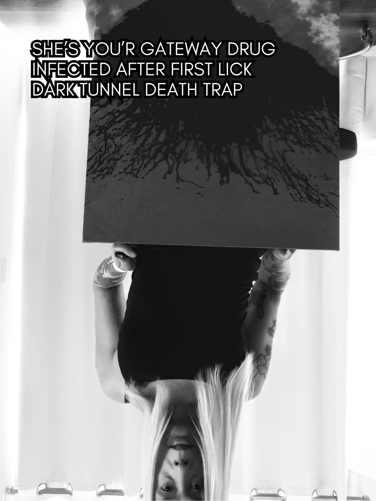 Black-and-white selfie portrait of writer and artist, Baroque Medusa